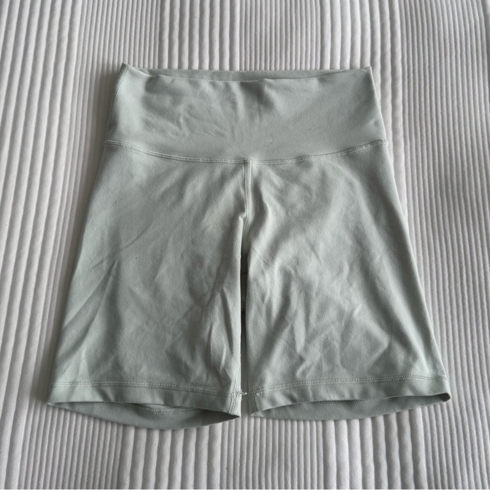 Aritzia TNA teal biker shorts